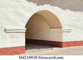 Arched Tunnel Doorway in Adobe Mission Wall 