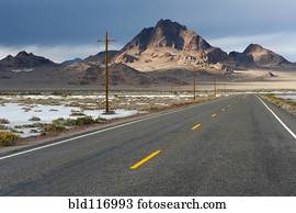 Two Lane Highway Passing Through the Desert