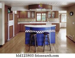 Counter tops and stools in open kitchen