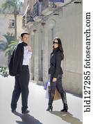 young couple on shopping trip in European street