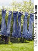 Jeans hanging from clothesline