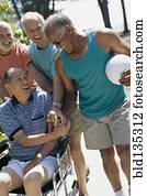 Senior men relaxing outdoors Senior men relaxing outdoors