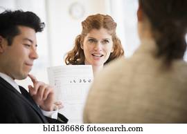 Business people talking in meeting