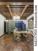 Chandelier in modern office lobby