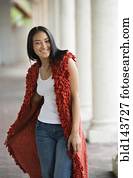 Black woman wearing draping vest