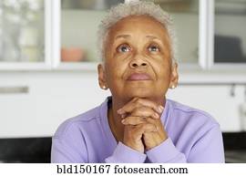 African American woman praying
