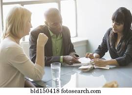 Business people talking in meeting