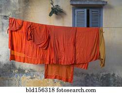 Buddhist monk robes hanging on clothesline