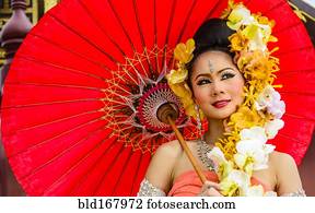 http://cdn-grid.fotosearch.com/BLD/BLD212/asian-woman-with-flower-headdress-stock-photo__bld167972.jpg