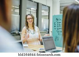 Business people talking in office meeting