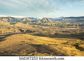 Distant hills and rock formations in remote landscape