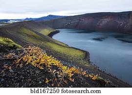 High angle view of volcanic rock and river in remote landscape