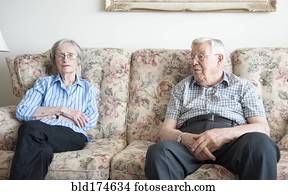 Couple sitting on sofa Couple sitting on sofa