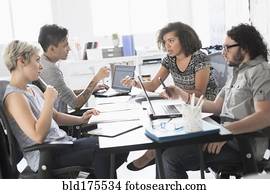 Business people talking in meeting