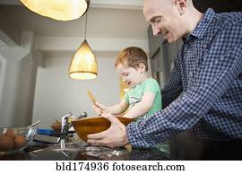 pai, ensinando, filho, cozinhar, em, cozinha