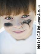Caucasian baseball player with marks on cheeks