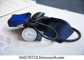Close up of blood pressure cuff on table