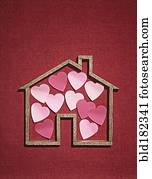 House shape with cutout hearts