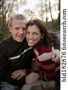 Smiling couple hugging outdoors Smiling couple hugging outdoors