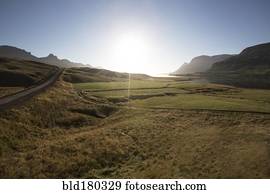 Sunrise over remote fields