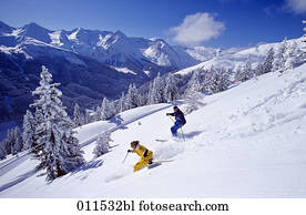 couple skiing in winter landscape couple skiing in winter landscape