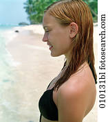 portrait of young teenage woman in bikini on the beach portrait of young teenage woman in bikini on the beach
