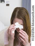 crying young woman holding tissue crying young woman holding tissue