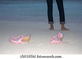 high heels on the beach