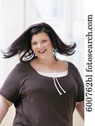 porträt, von, lächeln, übergewichtige frau