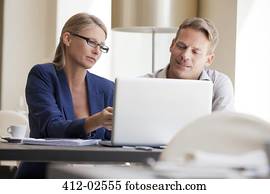 Business people working on laptop