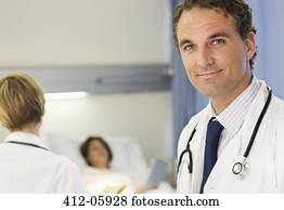 Doctor smiling in hospital room