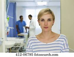 Patient standing in hospital room
