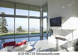 Sofa, television and fireplace in modern living room