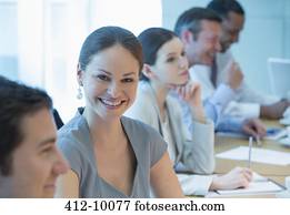Businesswoman smiling in meeting