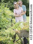 Senior couple gardening