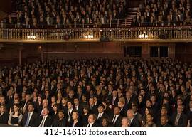 Audience watching performance in theater
