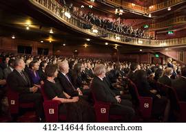 Audience watching performance in theater