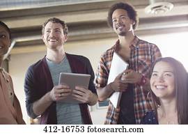 Casual business people smiling in meeting