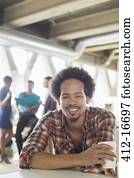 Portrait of casual businessman drinking coffee