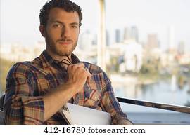 Portrait of serious casual businessman