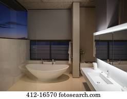 Soaking tub in modern bathroom