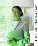 Smiling doctor with clipboard in hospital Smiling doctor with clipboard in hospital