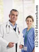 Portrait of smiling doctor and nurse