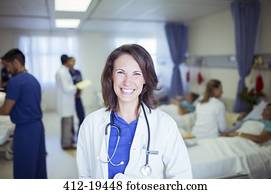 Doctor smiling in hospital room