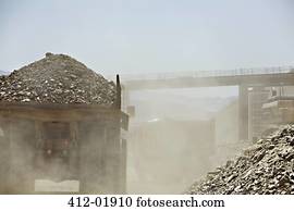 Truck carting rubble in quarry