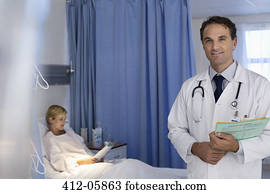 Doctor smiling in hospital room