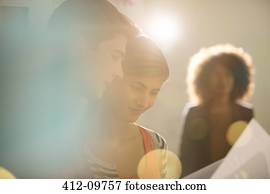 Business people reading paperwork