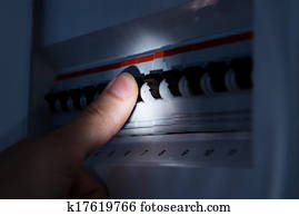 Hand Testing Electrical Board