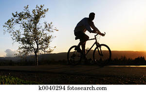 Man riding his bike Man riding his bike