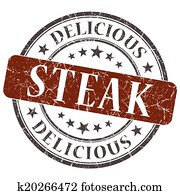Steak brown round grungy stamp isolated on white background Steak brown round grungy stamp isolated on white background